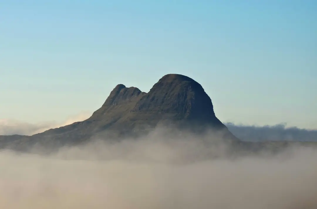 The dome of Suilven in Assynt rising out of a bank of morning mist